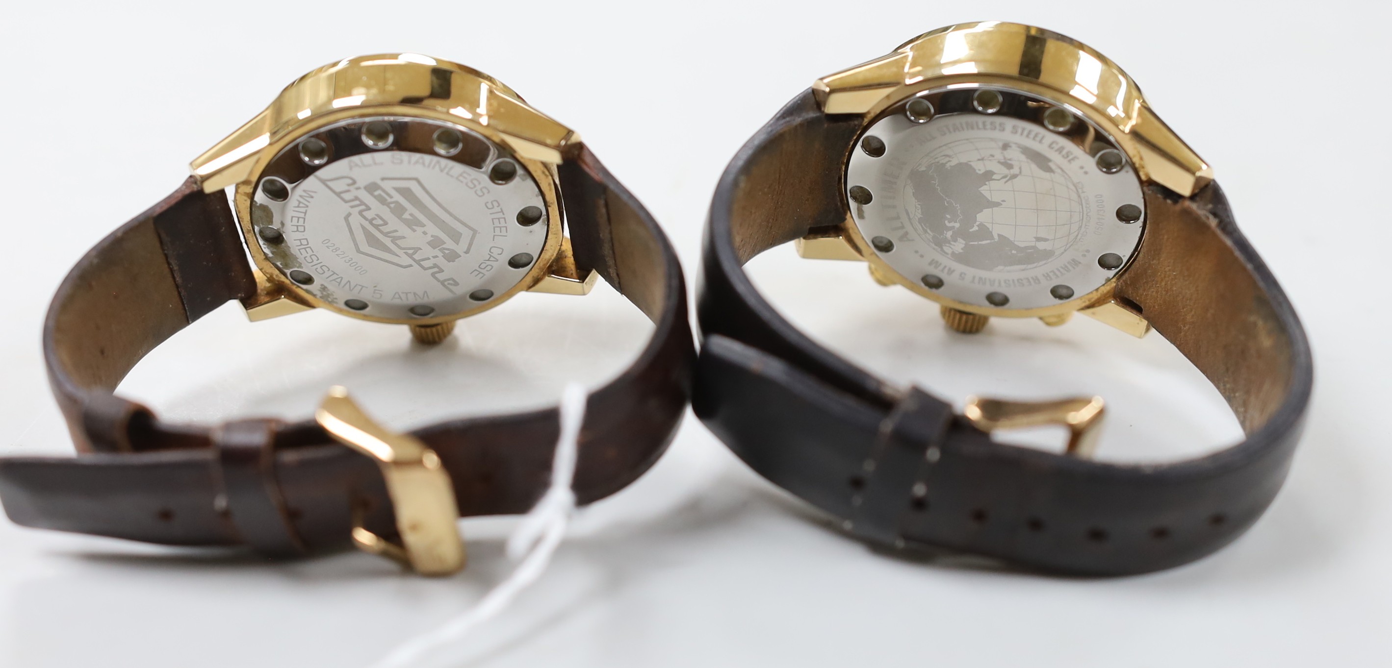 A gentleman's modern gilt metal Vostok Europe Perpetual Calendar wrist watch and a similar Limousine Gaz-4 wrist watch.